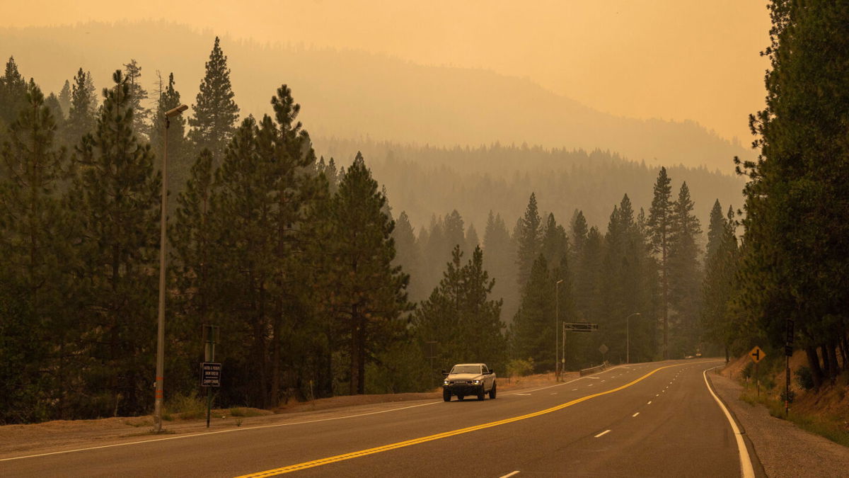 <i>David Rodriguez/The Salinas Californian/Imagn Content Services</i><br/>Smoke from the Caldor Fire hangs heavy in the air in El Dorado County