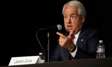 Republican gubernatorial candidate John Cox was served with a subpoena while onstage during a debate held in Sacramento