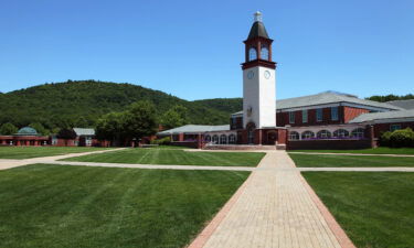 Quinnipiac University rolls out fines and Wi-Fi restrictions for unvaccinated students. This image shows Quinnipiac's Arnold Bernhard Library.