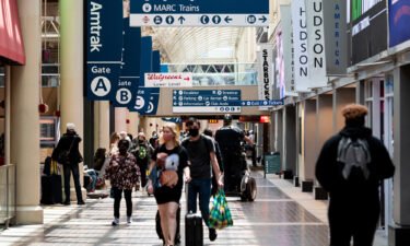Amtrak passengers walk through Union Station in Washington on Tuesday
