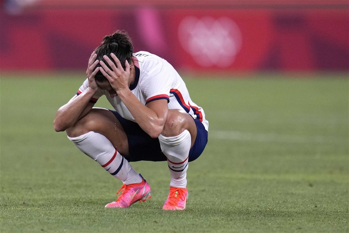 Carli Lloyd reacts after being defeated 1-0 by Canada during the women's semifinal soccer match at the 2020 Summer Olympics.