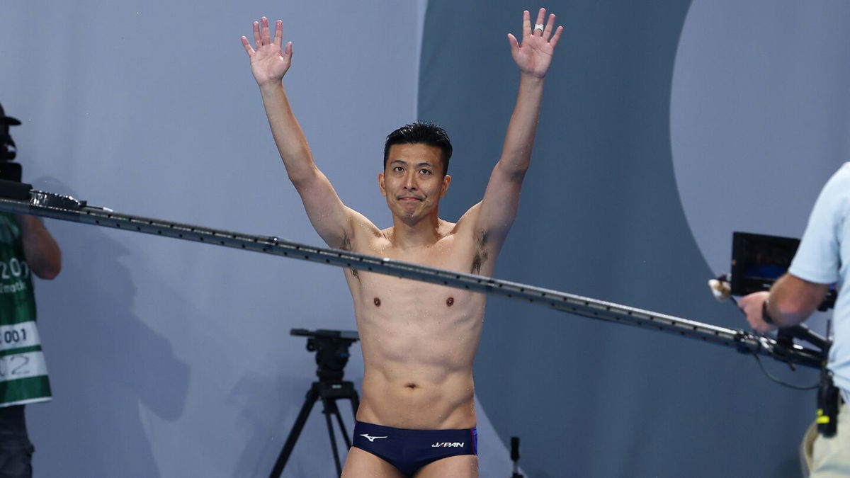 Ken Terauchi of Japan thanks the spectators after his final dive in the men's 3m springboard final on day eleven of the Tokyo 2020 Olympic Games at Tokyo Aquatics Centre on August 03