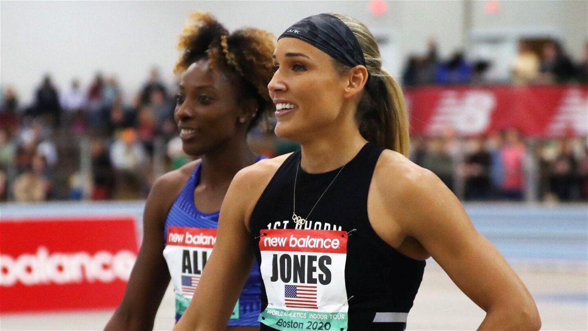 Lolo Jones and Nia Ali walk together in the infield after the first heat of the Women's 60m hurdles during the New Balance Indoor Grand Prix at Reggie Lewis Center on January 25
