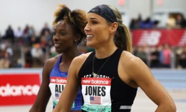 Lolo Jones and Nia Ali walk together in the infield after the first heat of the Women's 60m hurdles during the New Balance Indoor Grand Prix at Reggie Lewis Center on January 25