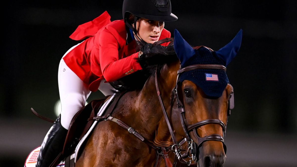 Close up shot of Jessica Sprinsteen and her horse jumping