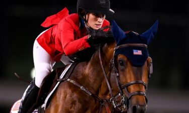 Close up shot of Jessica Sprinsteen and her horse jumping