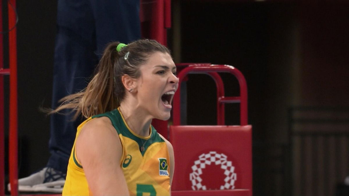 Member of the Brazil women's volleyball team cheers