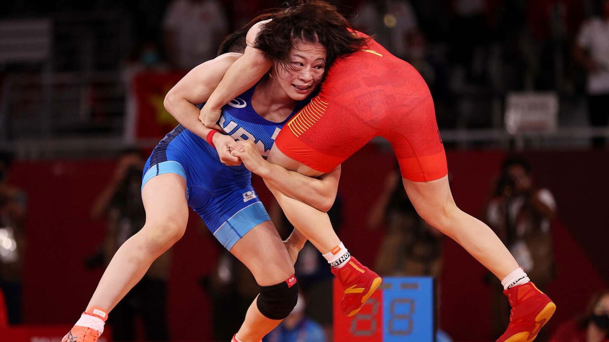 Japan's Mukaida Mayu overpowers Pang Qianyu to win 53kg gold