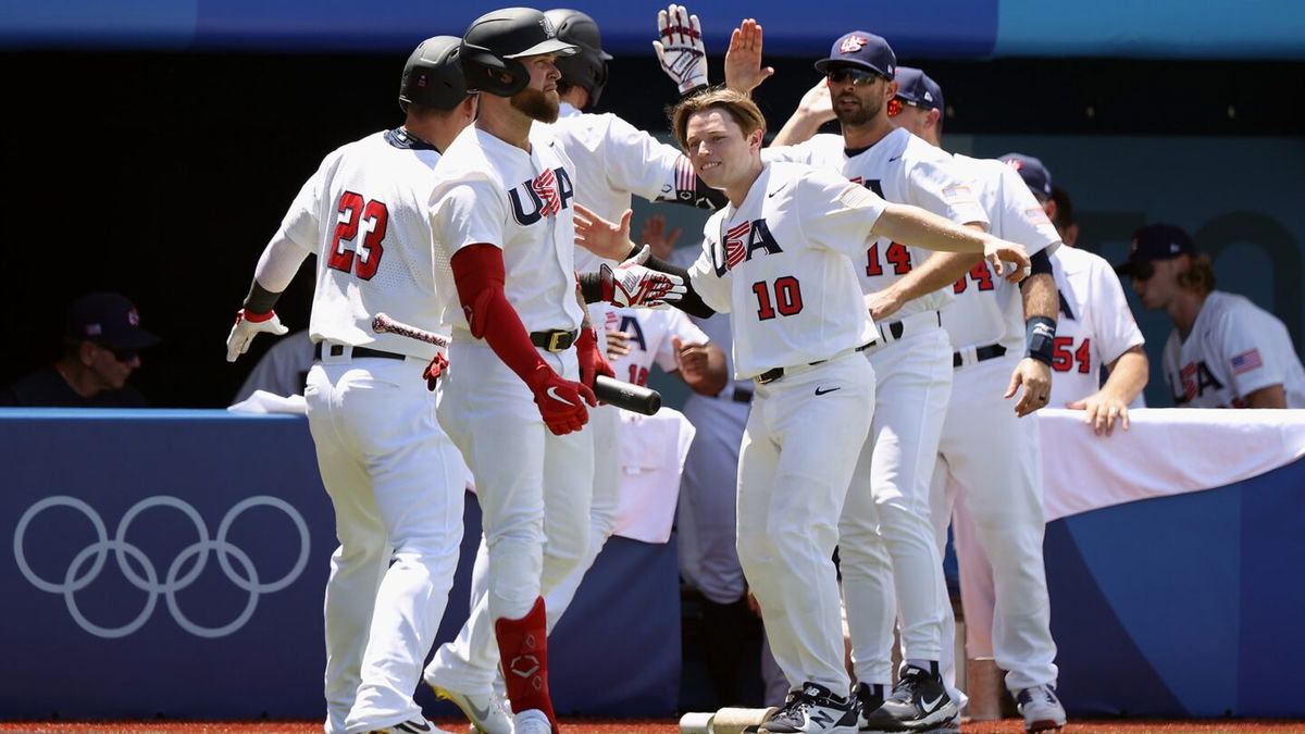 USA baseball celebrates against the Dominican Republic