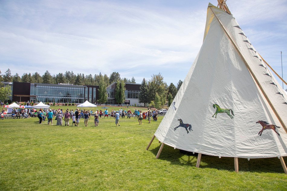 Scene from Salmon Bake on COCC campus in 2018