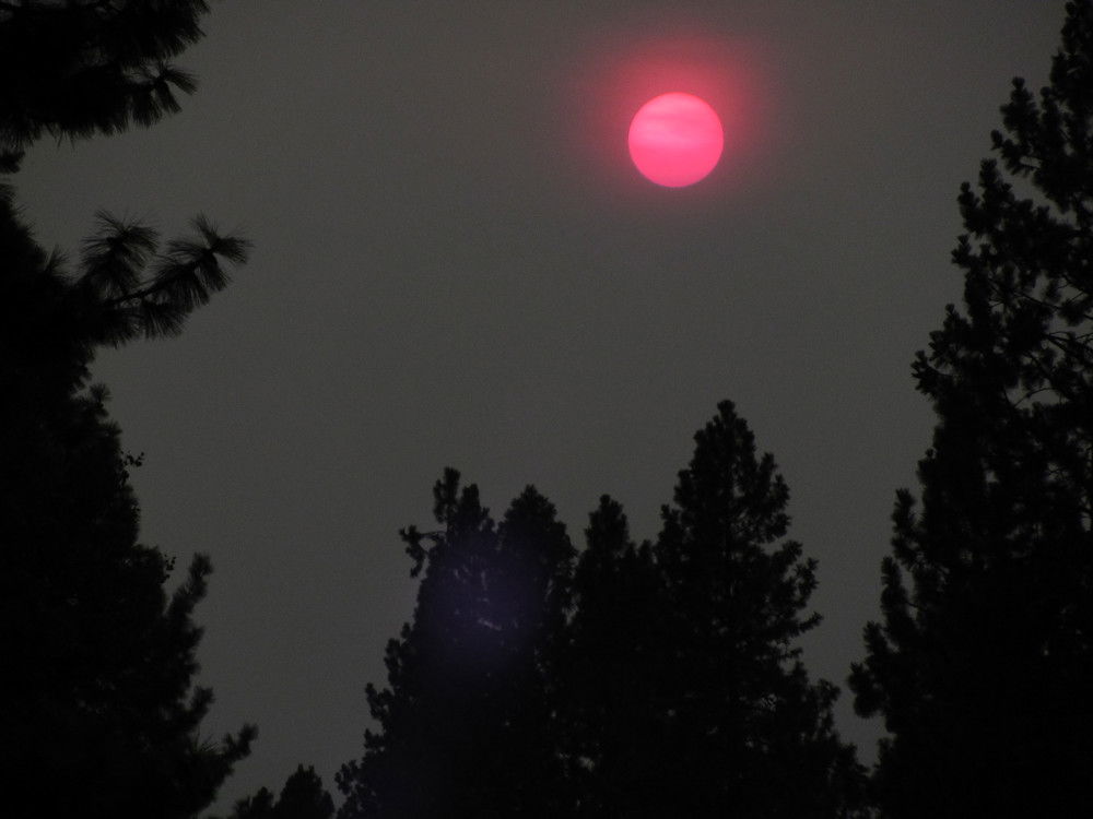 A red or orange sun has been a frequent sight across the High Desert recently, as in this sunset view in Bend on Wednesday evening