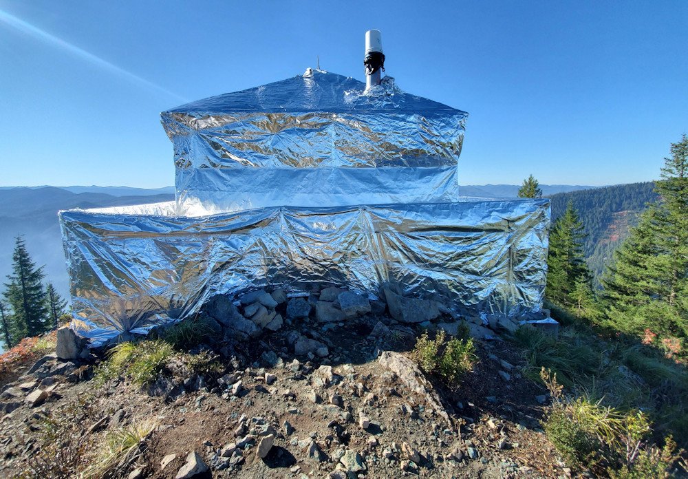The Gold Butte Lookout has been wrapped in foil structure wrap to protect from the Bull Complex Fire