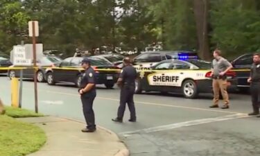 Police and other first responders are seen at Mount Tabor High School in Winston-Salem