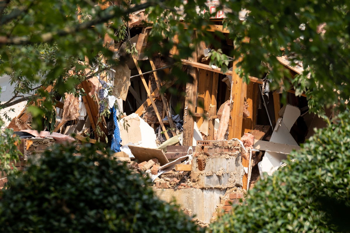 <i>Ben Gray/AP</i><br/>A explosion at an apartment complex north of Atlanta injured four people and destroyed several floors of a building.