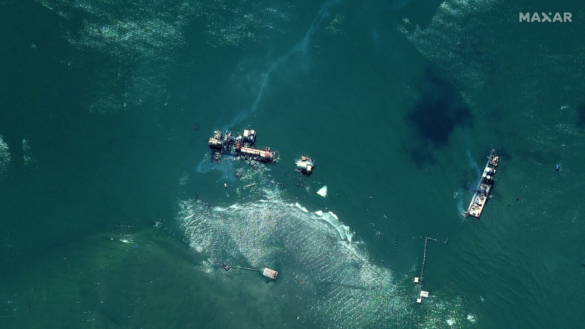 <i>Satellite image © 2021 Maxar Technologies</i><br/>Oil slicks on the water near the East Timbalier Island National Wildlife Refuge and the area south of Port Fourchon