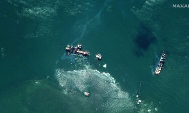 Oil slicks on the water near the East Timbalier Island National Wildlife Refuge and the area south of Port Fourchon