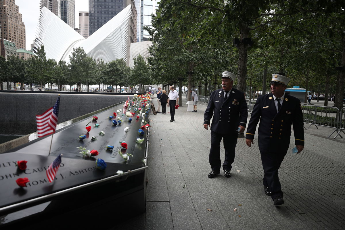 <i>Tayfun Coskun/Anadolu Agency/Getty Images</i><br/>Family members of 9/11 victims tribute their loved ones on the 19th anniversary of September 11 attacks in New York City
