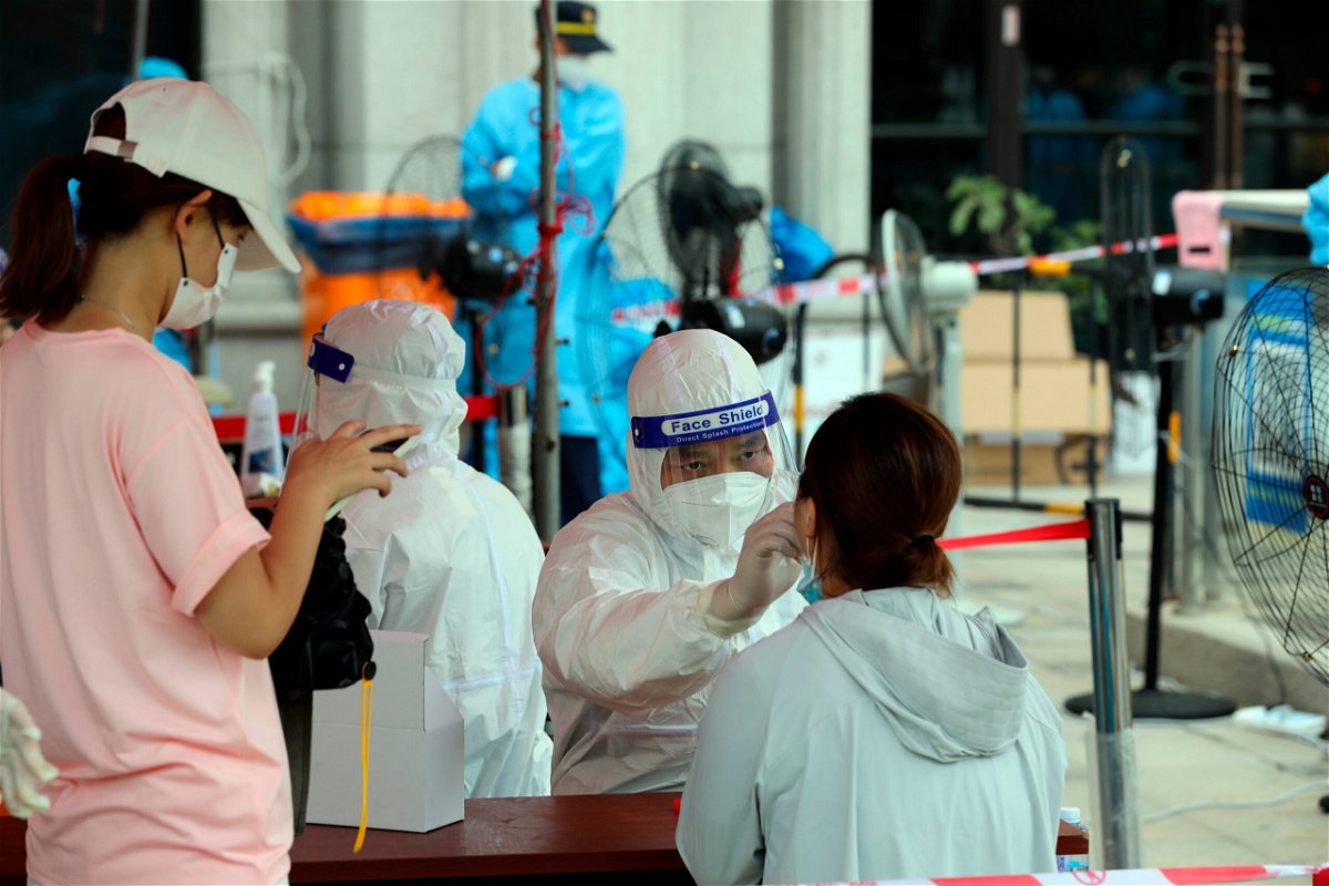 <i>Nava Chung/FeatureChina/AP</i><br/>China rushes to contain a Delta Variant outbreak ahead of a major upcoming national holiday. Pictured is a temporary Covid-19 test site in southeast China's Fujian province Tuesday