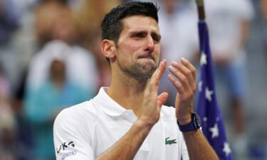 Djokovic reacts tearfully after falling short in his bid to win a 21st grand slam title.