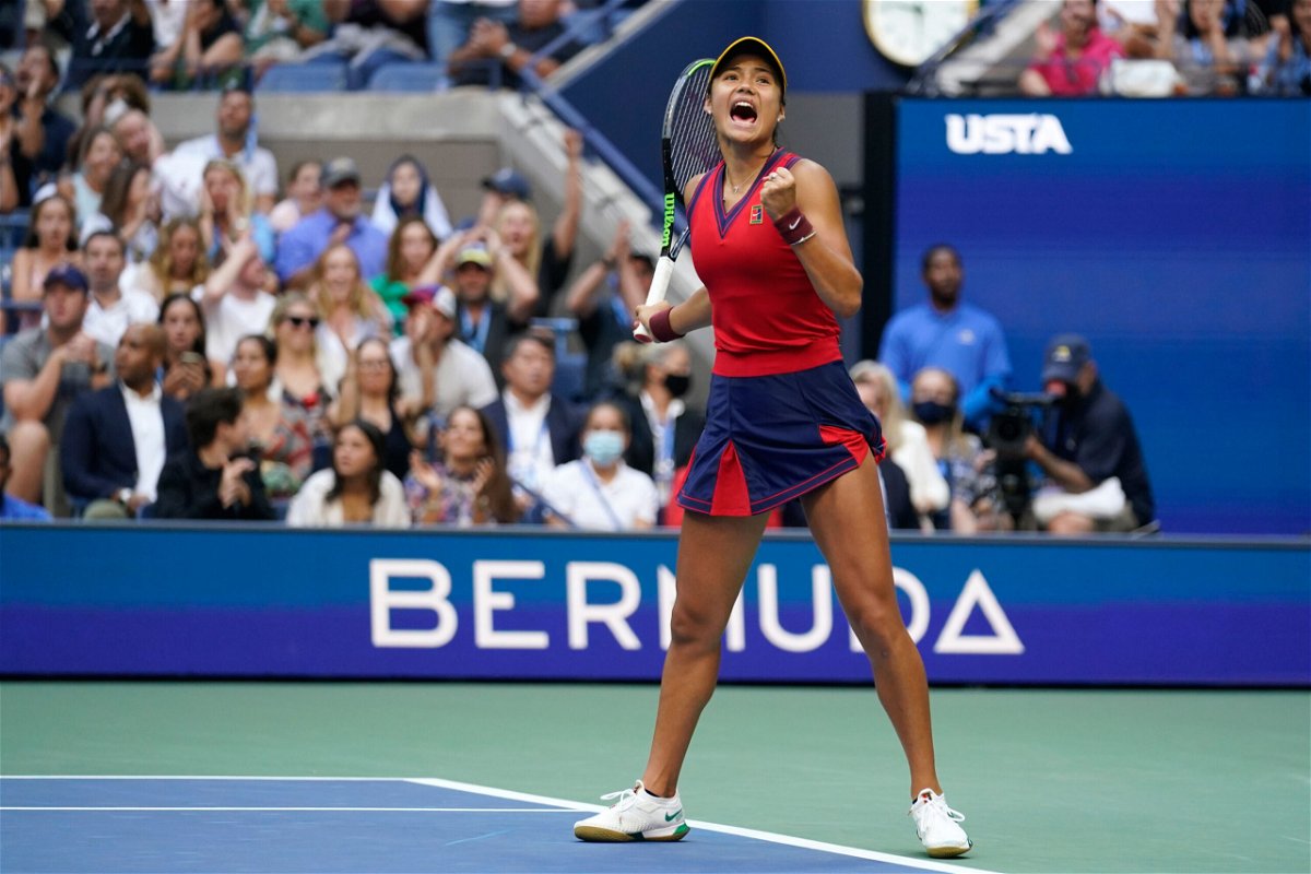<i>Seth Wenig/AP</i><br/>Emma Raducanu reacts after scoring a point against Leylah Fernandez during the women's singles final of the US Open Saturday in New York.
