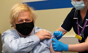 Britain's Prime Minister Boris Johnson receives his first dose of the AstraZeneca/Oxford Covid-19 vaccine in London on March 19.