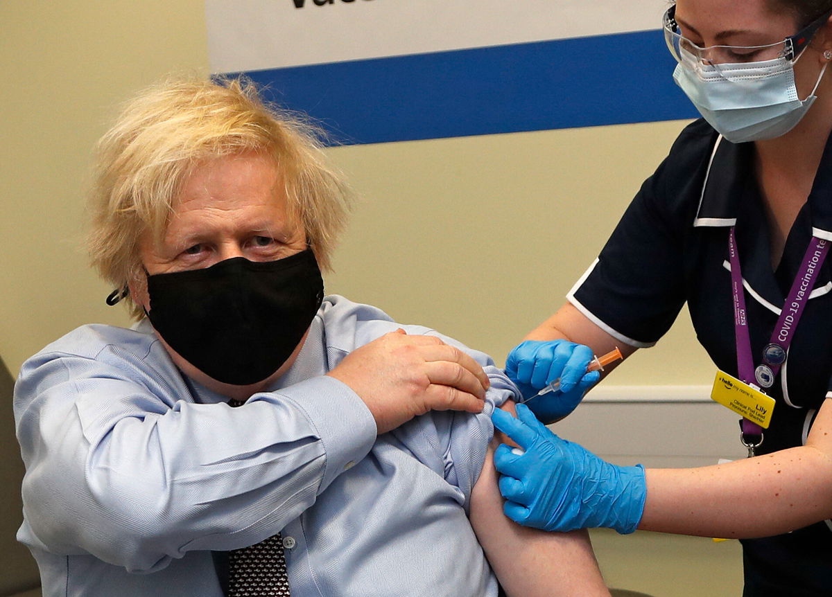 <i>Frank Augstein/Pool/AFP/Getty Images</i><br/>Britain's Prime Minister Boris Johnson receives his first dose of the AstraZeneca/Oxford Covid-19 vaccine in London on March 19.