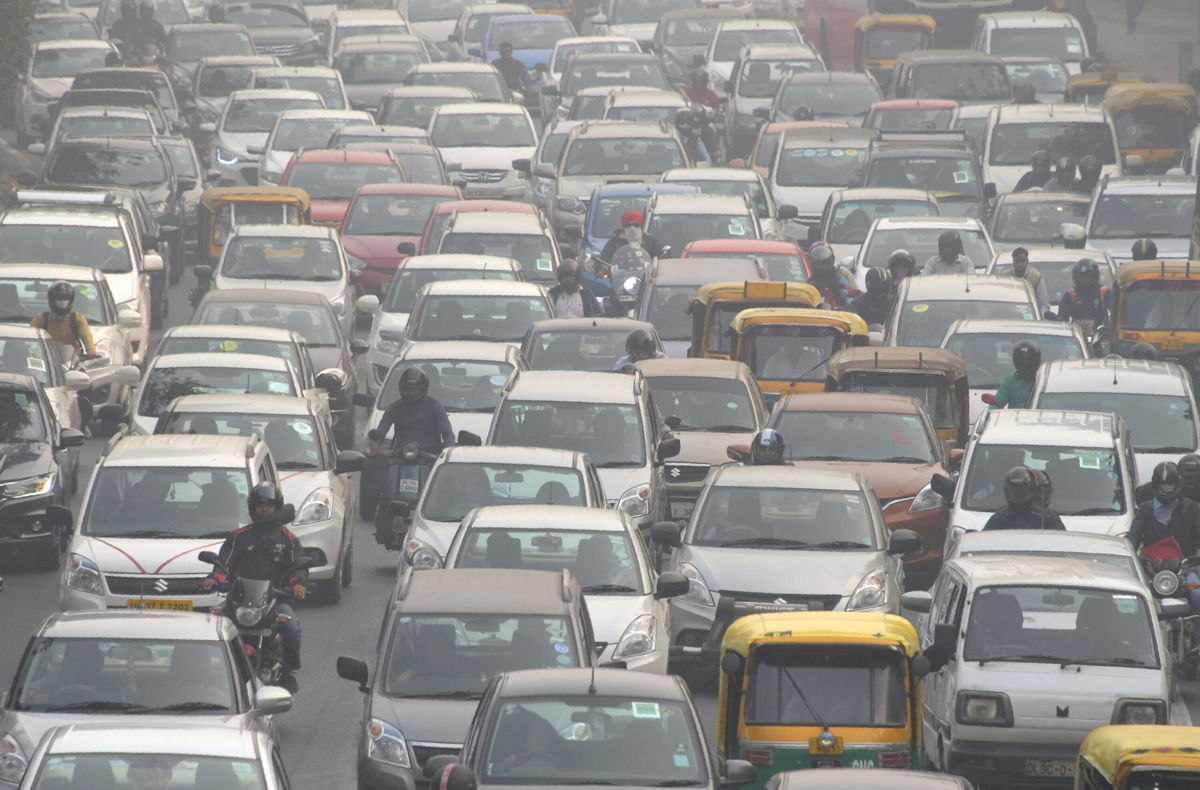 <i>Dominique Faget/AFP/Getty Images</i><br/>Motorists drive amid heavy smog in New Delhi on November 14
