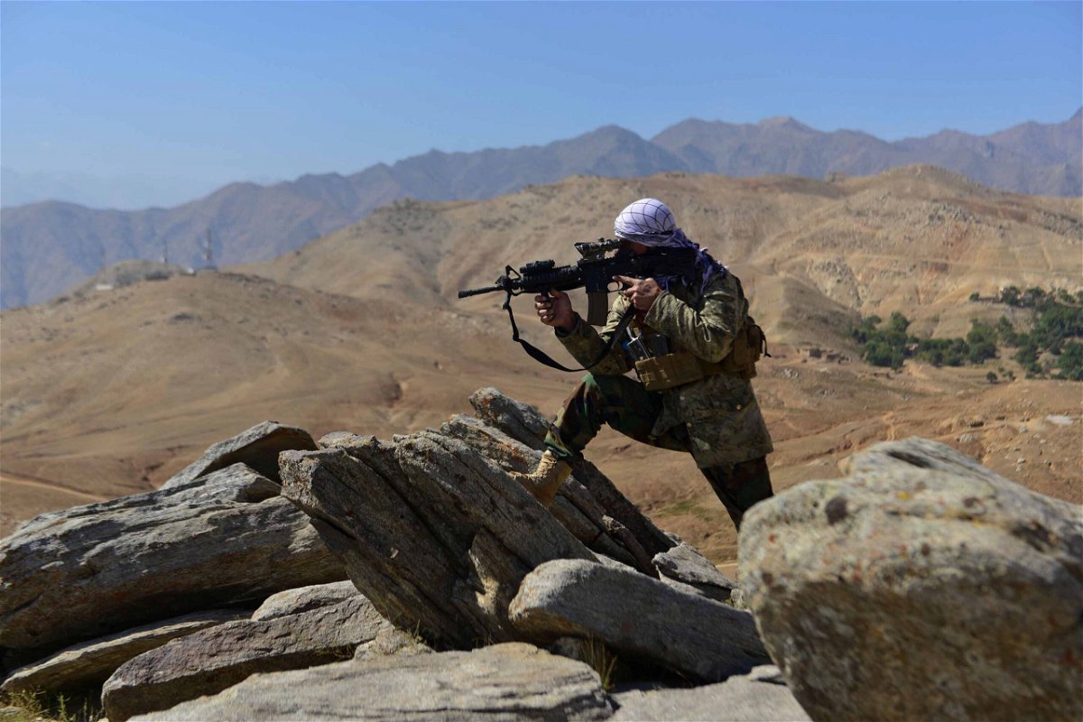 <i>AHMAD SAHEL ARMAN/AFP/Getty Images</i><br/>An anti-Taliban fighter takes a position during a patrol on a hilltop in Darband area in Anaba district