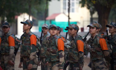 Female recruit soldiers from the Indian army wait during a media visit to the Corps of Military Police Centre and School on March 31 in Bengaluru