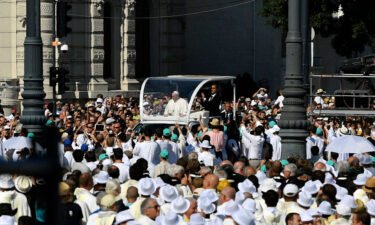 Francis arrives in his popemobile to celebrate mass for the closing of the International Eucharistic Congress at Budapest's Heroes Square.