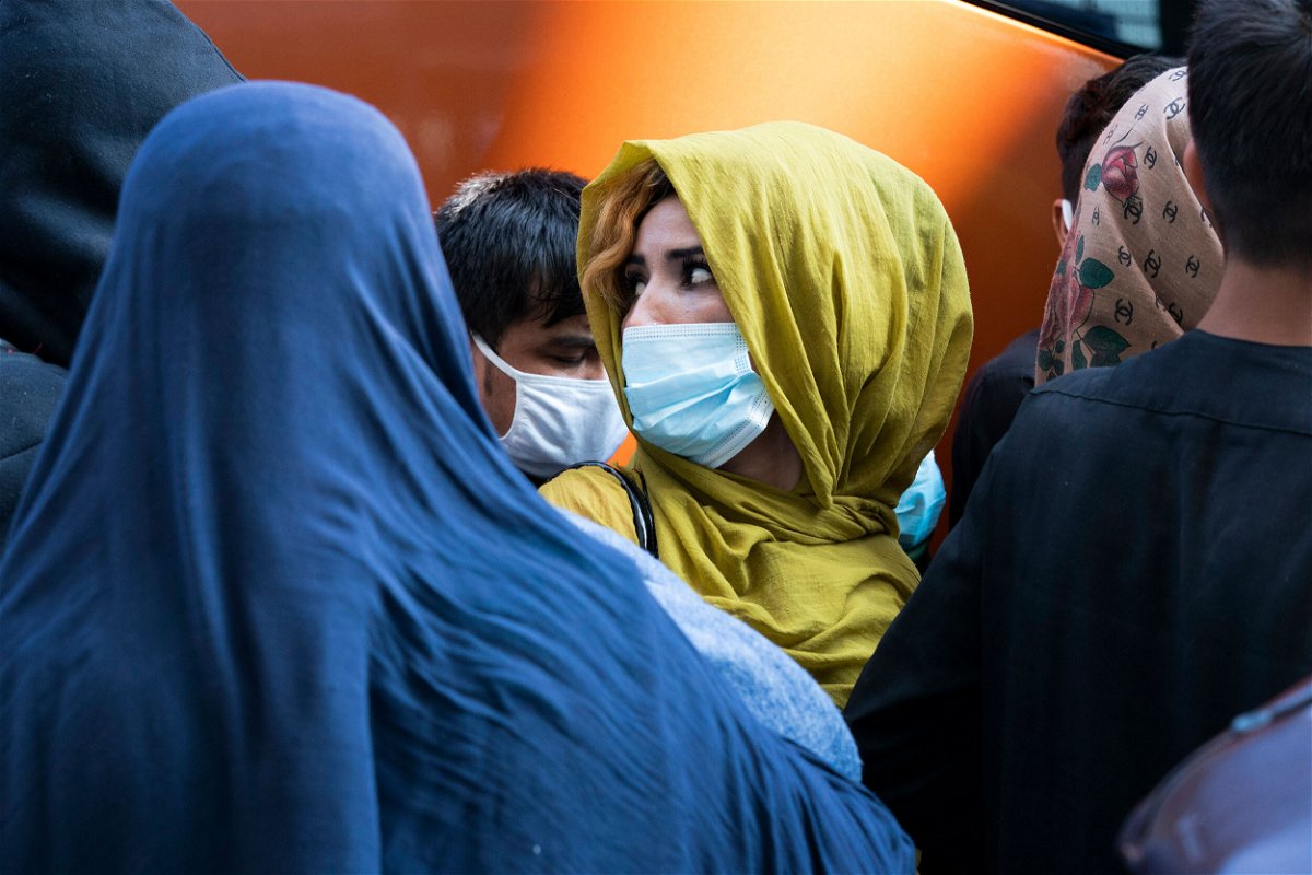 <i>Jose Luis Magana/AP</i><br/>Families evacuated from Kabul