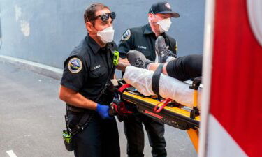 Paramedics respond to a heat exposure call during a heat wave in Salem
