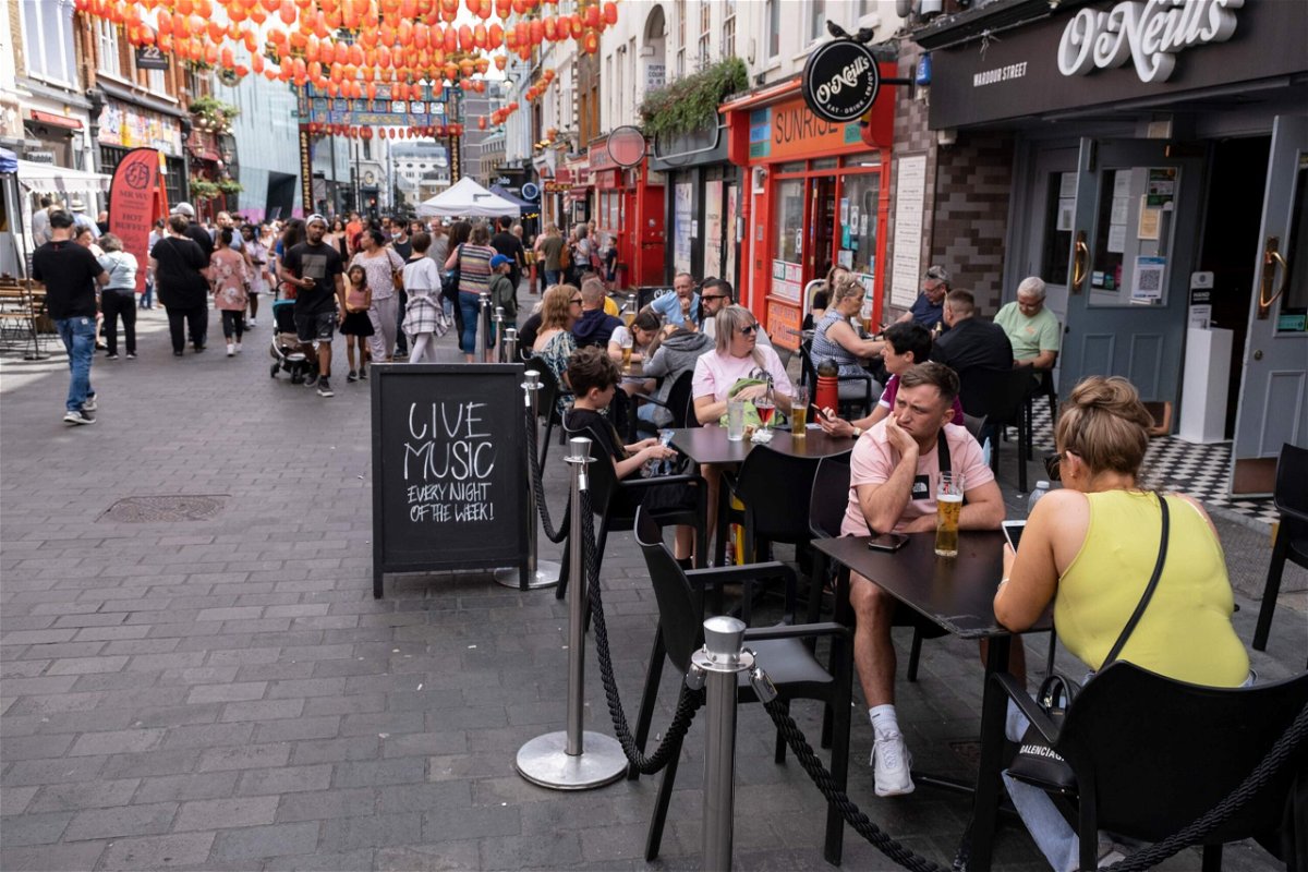 <i>Mike Kemp/In Pictures/Getty Images</i><br/>UK inflation spikes at a record rate in August. This image from August 10 shows restaurant diners in London's Chinatown.