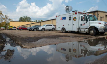 Emergency vehicles respond to evacuate people at a mass shelter on Sept. 2 in Independence