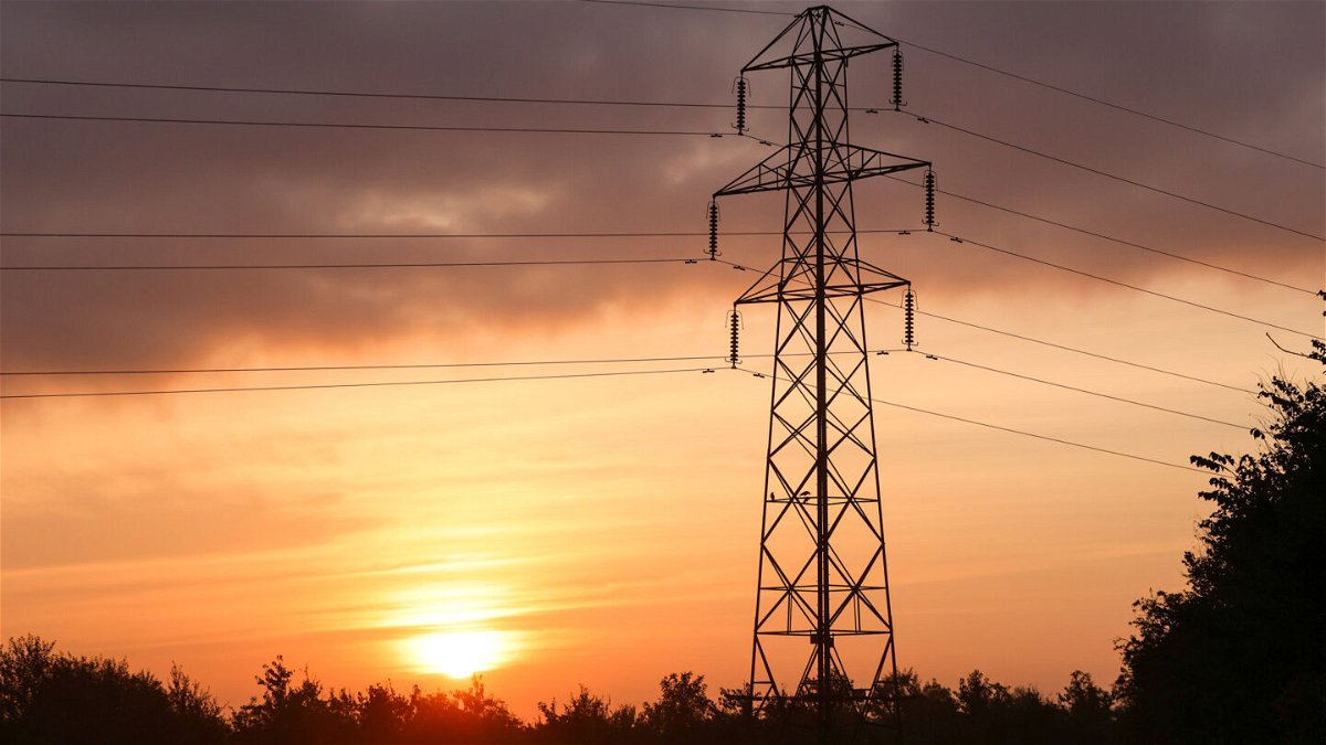 <i>Chris Ratcliffe/Bloomberg via Getty Images</i><br/>80 million European households struggle to stay warm. Rising energy costs will make the problem worse. Pictured is an electricity transmission tower near Rayleigh