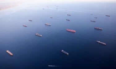 Container ships anchored by the ports of Long Beach and Los Angeles as they wait to offload on September 20.