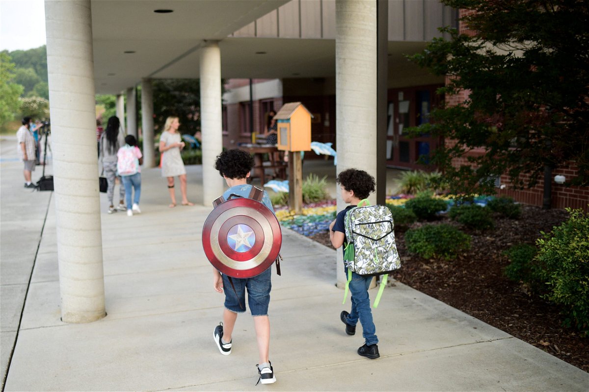 <i>Calvin Mattheis/News Sentinel/USA Today Network</i><br/>Students arrive on the first day of Knox County Schools at Dogwood Elementary School in Knoxville on August 9