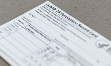 A Covid-19 vaccine record card is seen at Florida Memorial University Vaccination Site in Miami Gardens