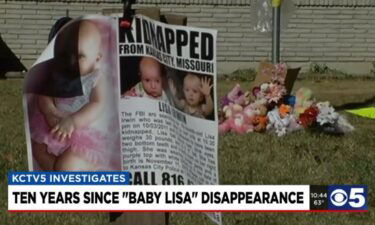 A poster and memorial remember Baby Lisa