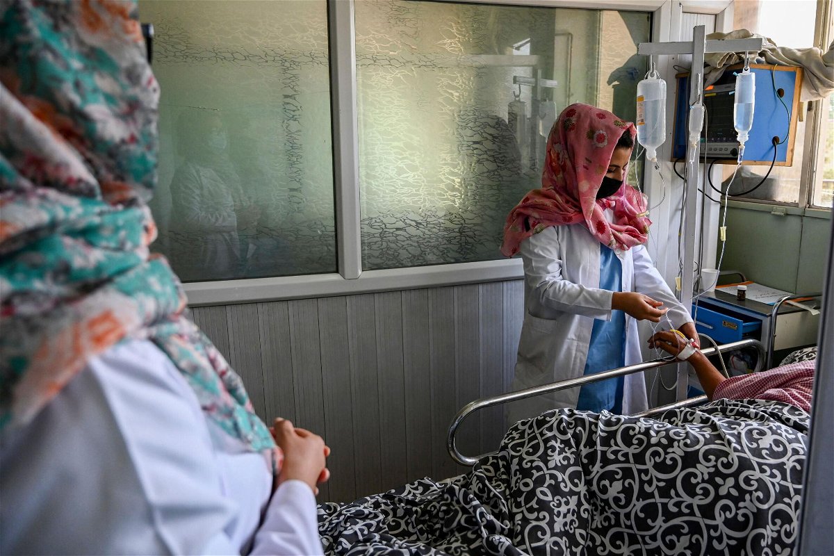 <i>Aamir Qureshi/AFP/Getty Images</i><br/>Female nurses takes care of patients at Wazir Akbar Khan hospital in Kabul on September 1.