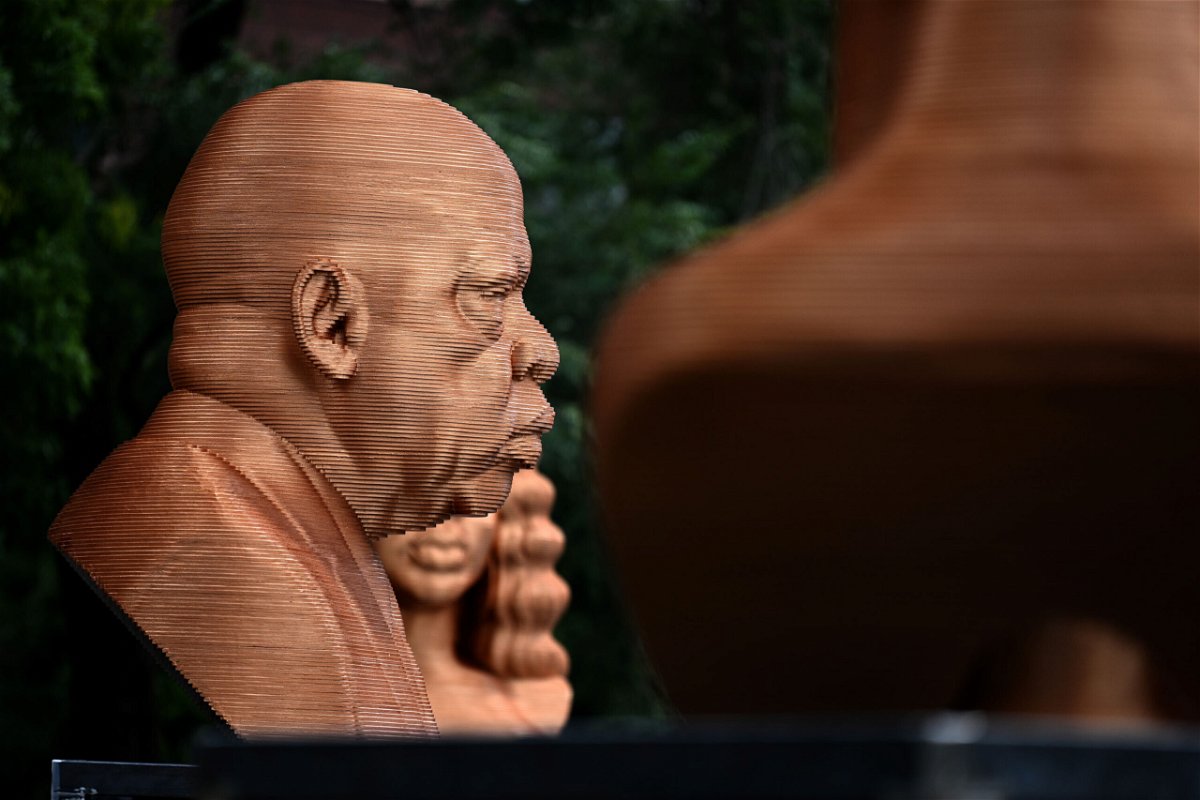 <i>Alexi Rosenfeld/Getty Images</i><br/>Three bronze busts depicting the late Congressman John Lewis
