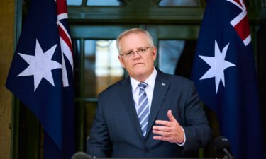 Australian Prime Minister Scott Morrison announced Friday he will travel to Glasgow for the COP26 climate summit. Morrison is shown here speaking at a new conference on October 7 in Canberra