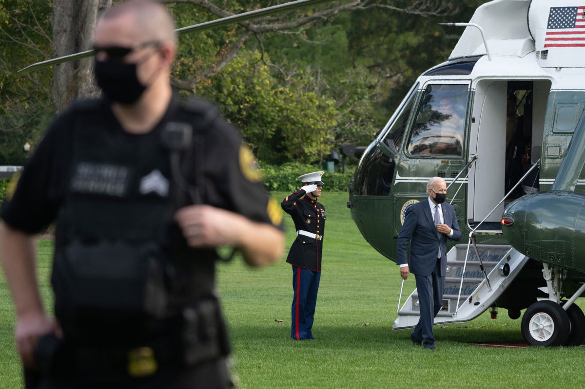 <i>Chris Kleponis/CNP/Bloomberg/Getty Images</i><br/>President Joe Biden exits Marine One on the South Lawn of the White House in Washington