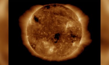 A geomagnetic storm triggered by a flare of solar energy hit Earth on Monday
