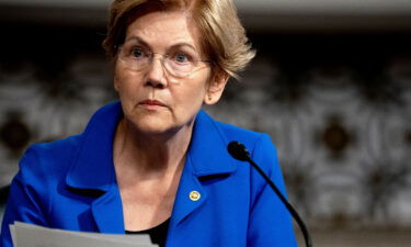 Senator Elizabeth Warren on Monday urged the Securities and Exchange Commission to launch an insider trading investigation into transactions by high-level officials at the Federal Reserve. Warren is shown here during a Senate Armed Services Committee hearing on September 28