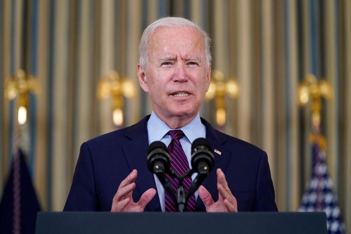 <i>Evan Vucci/AP</i><br/>President Joe Biden on Tuesday will travel to Michigan to rally support for his twin economic packages. Biden is shown here in the State Dining Room of the White House