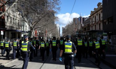 A total of 43 police staff in the Australian state of Victoria have been stood down from duty and could face being fired after they failed to comply with a Covid-19 vaccine mandate. A heavy Victoria Police presence is seen here as anti-lockdown protesters take to the streets on August 21 in Melbourne