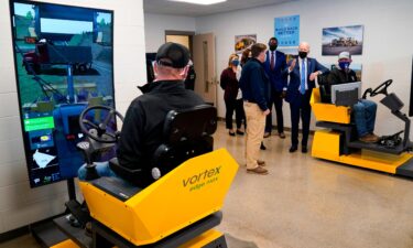 President Joe Biden said it's "a real possibility" that Democrats would establish a carveout of the filibuster rules to let the debt ceiling be increased by a simple majority vote. Biden is shown here touring the International Union Of Operating Engineers Local 324 training facility