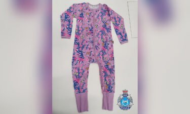 Cleo was last seen sleeping wearing a pink/purple one-piece sleep-suit with a blue and yellow pattern.
