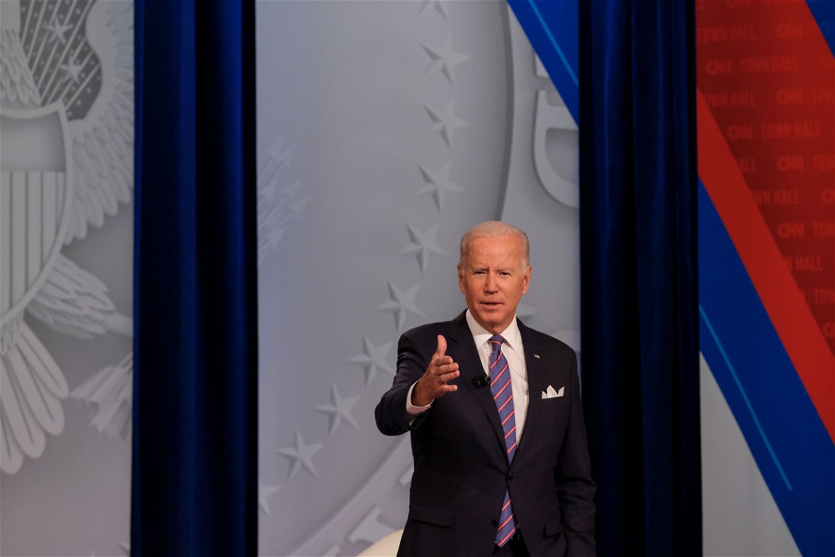 <i>Heather Fulbright/CNN</i><br/>US President Joe Biden with CNN anchor and host Anderson Cooper at CNN's Presidential Town Hall with Joe Biden in Baltimore